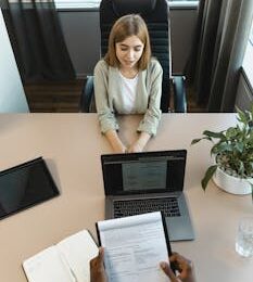 High-angle view of a job interview in a modern office setting, capturing professionalism.